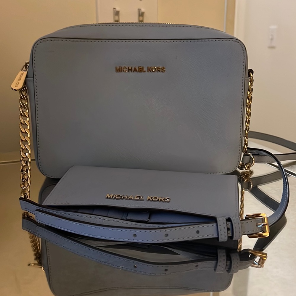 Michael Kors light blue cross body bag with wallet.
